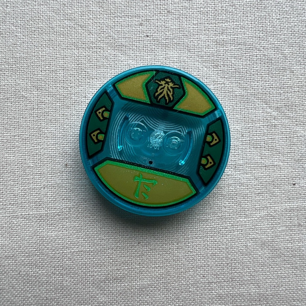 Lego Dimensions Toy Tag for Lloyd from the Ninjago Seties. Toy tag base only.